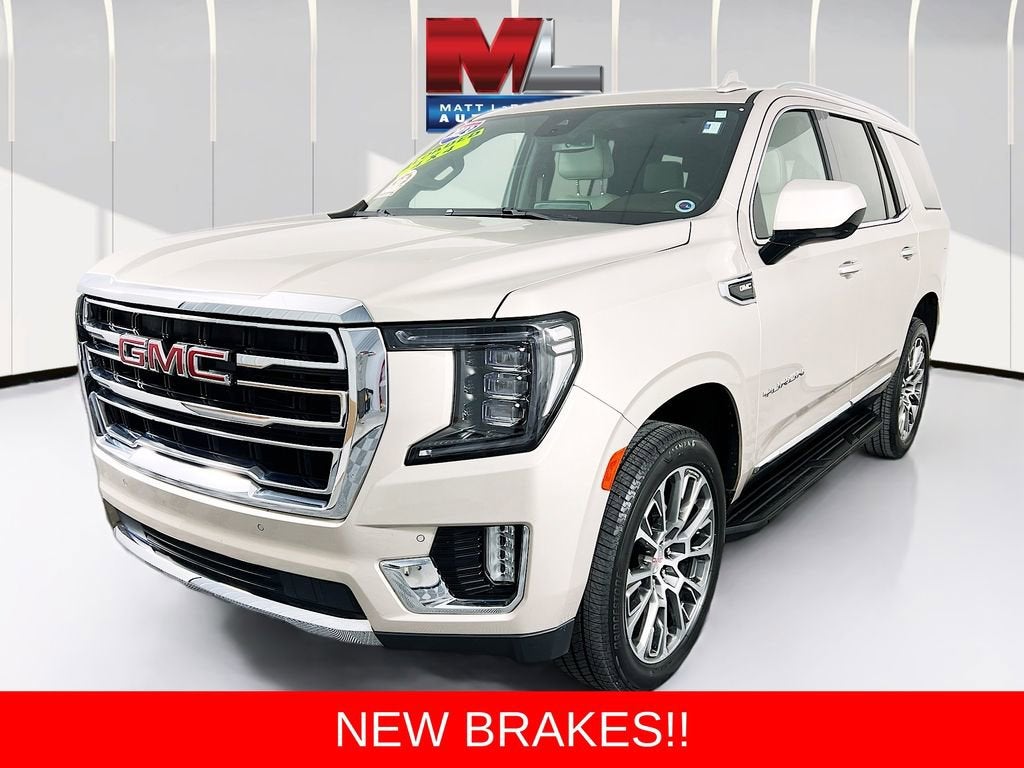 2023 GMC Yukon SLT in Pearl Beige Metallic — front three-quarter view