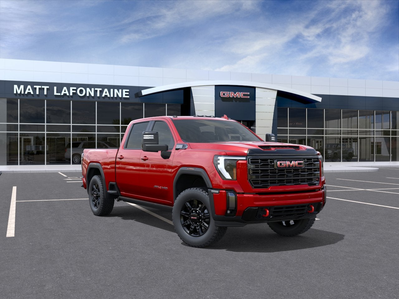2026 GMC Sierra 2500 HD AT4 in Volcanic Red Tintcoat — front three-quarter view