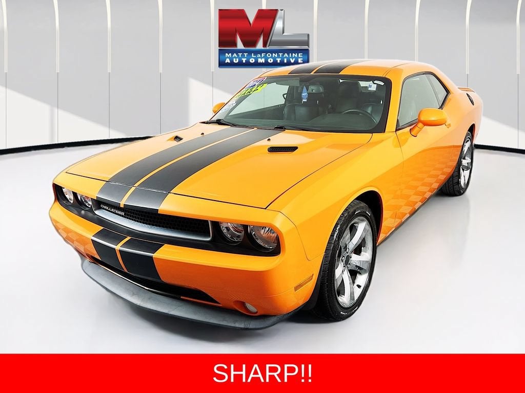 2014 Dodge Challenger SXT Plus in Orange — front three-quarter view